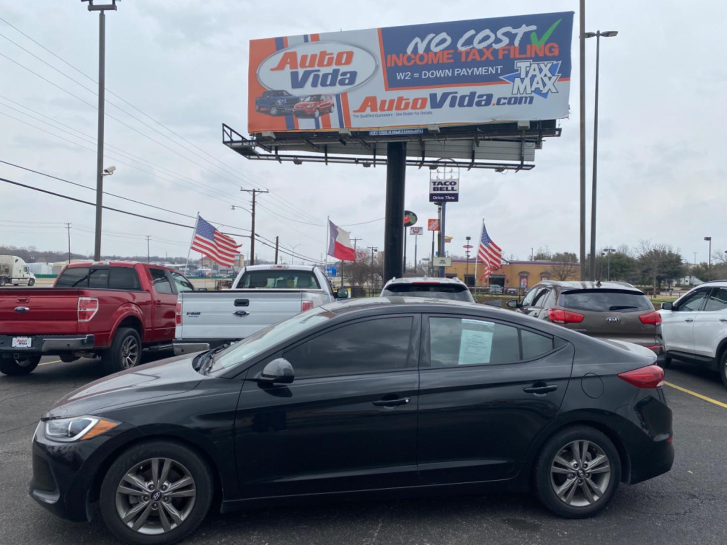 2017 BLACK Hyundai Elantra Limited (5NPD84LF5HH) with an 1.8L L4 DOHC 16V engine, 6A transmission, located at 420 I-35E, Lancaster, TX, 75146, (469) 297-4144, 32.593929, -96.823685 - Photo#0